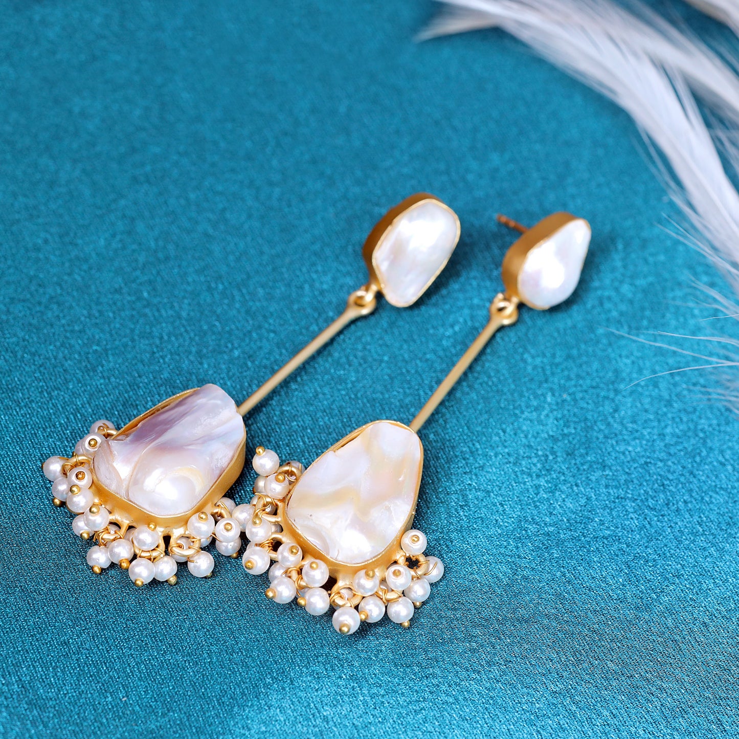 GAVI® Exquisite Mother of Pearl Danglers Showcasing Nature's Beauty and Style.