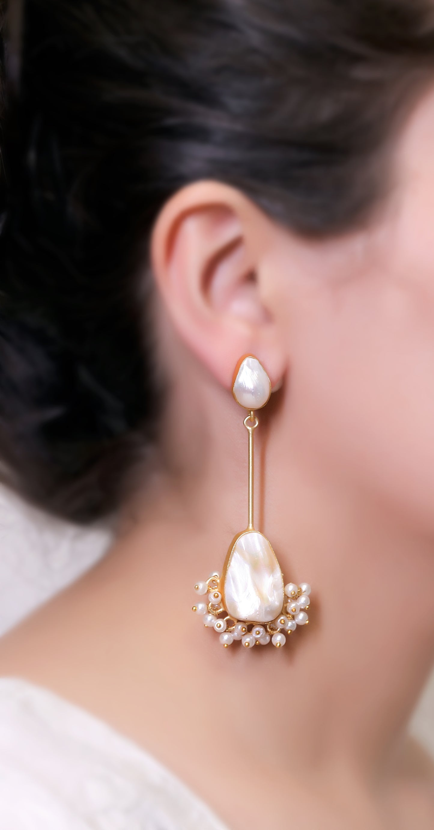 GAVI® Exquisite Mother of Pearl Danglers Showcasing Nature's Beauty and Style.