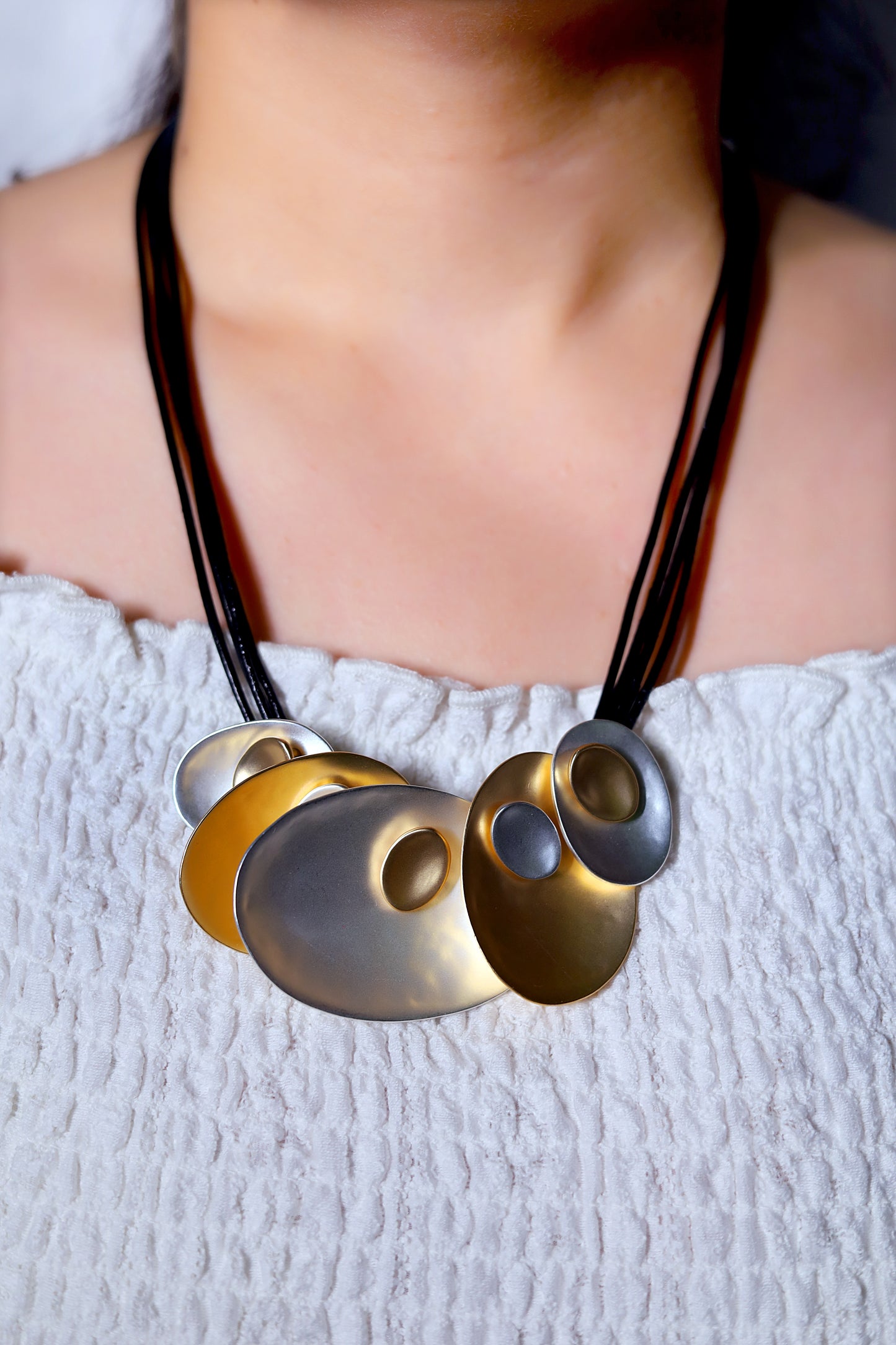 GAVI® Stainless Steel Vibrant Nested Shells Necklace Resonating Sounds of the Ocean.