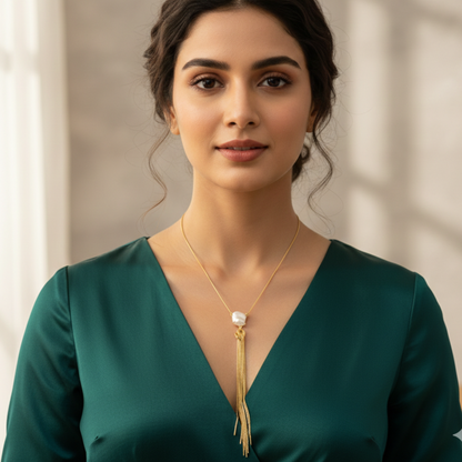 GAVI® Golden Tassel Necklace featuring a Luminous Freshwater Pearl