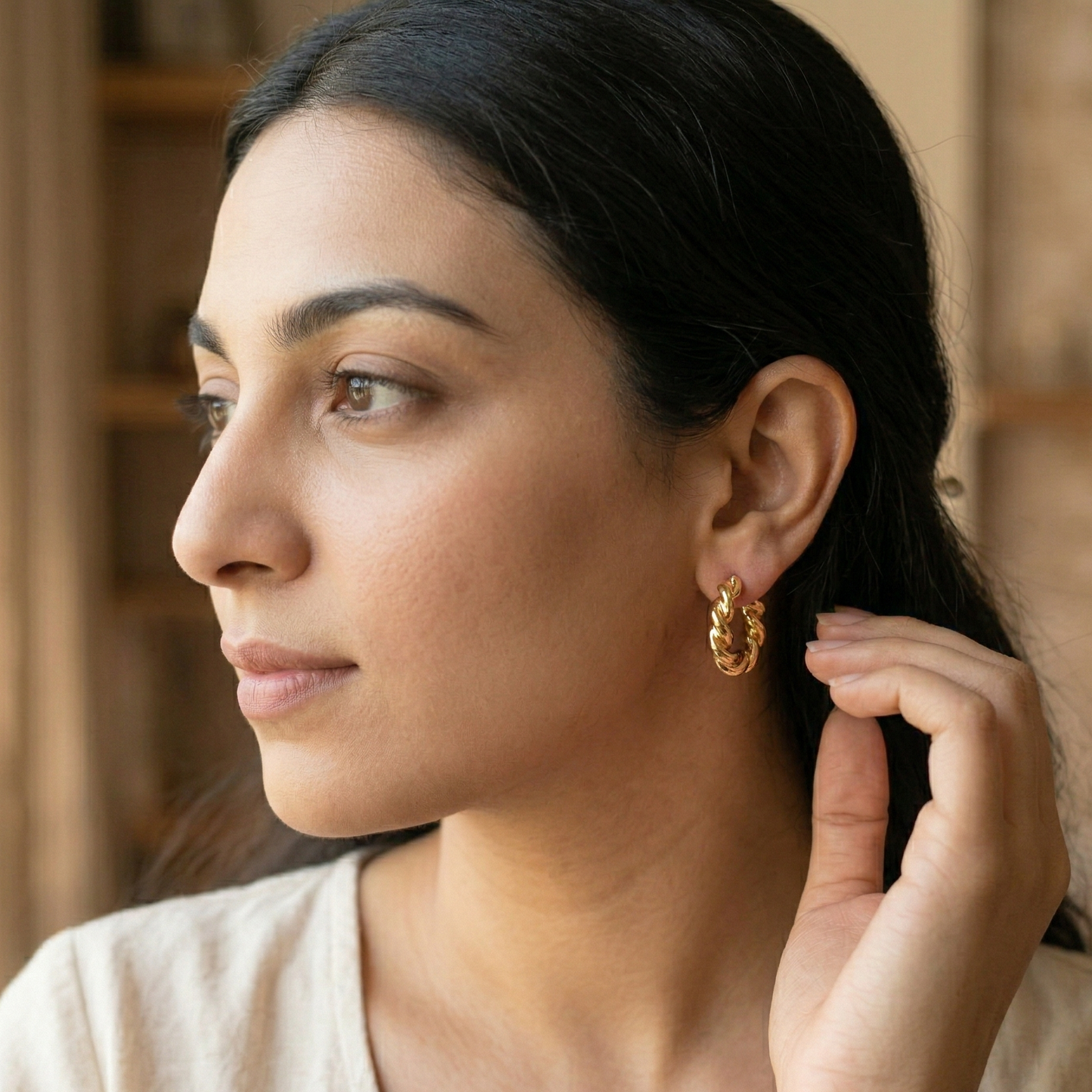GAVI® Modish Gold Twisted Hoop Earrings