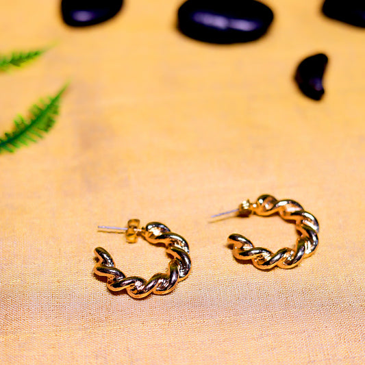 GAVI® Modish Gold Twisted Hoop Earrings.