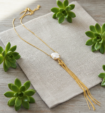 GAVI® Golden Tassel Necklace featuring a Luminous Freshwater Pearl